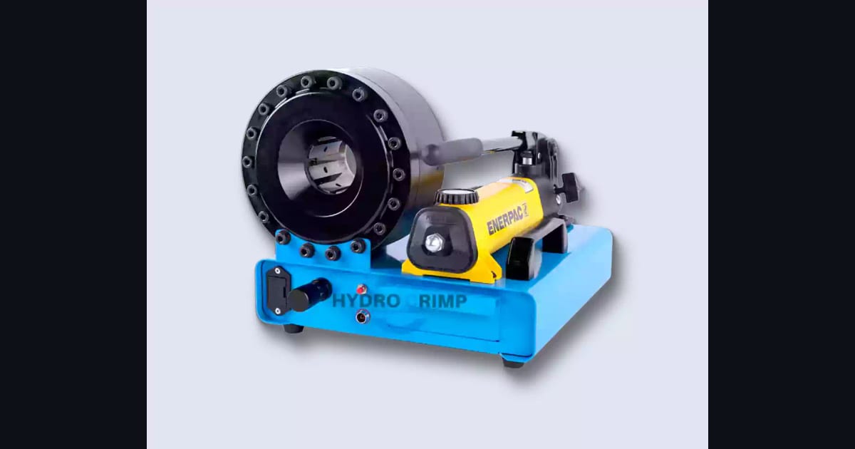 The HYDROCRIMP HC-P16MP manual hose crimper on a light background: a blue base with a die drawer and indicator light, a black sixteen-bolt crimping head with its die segments open, and a yellow Enerpac hand pump bolted alongside